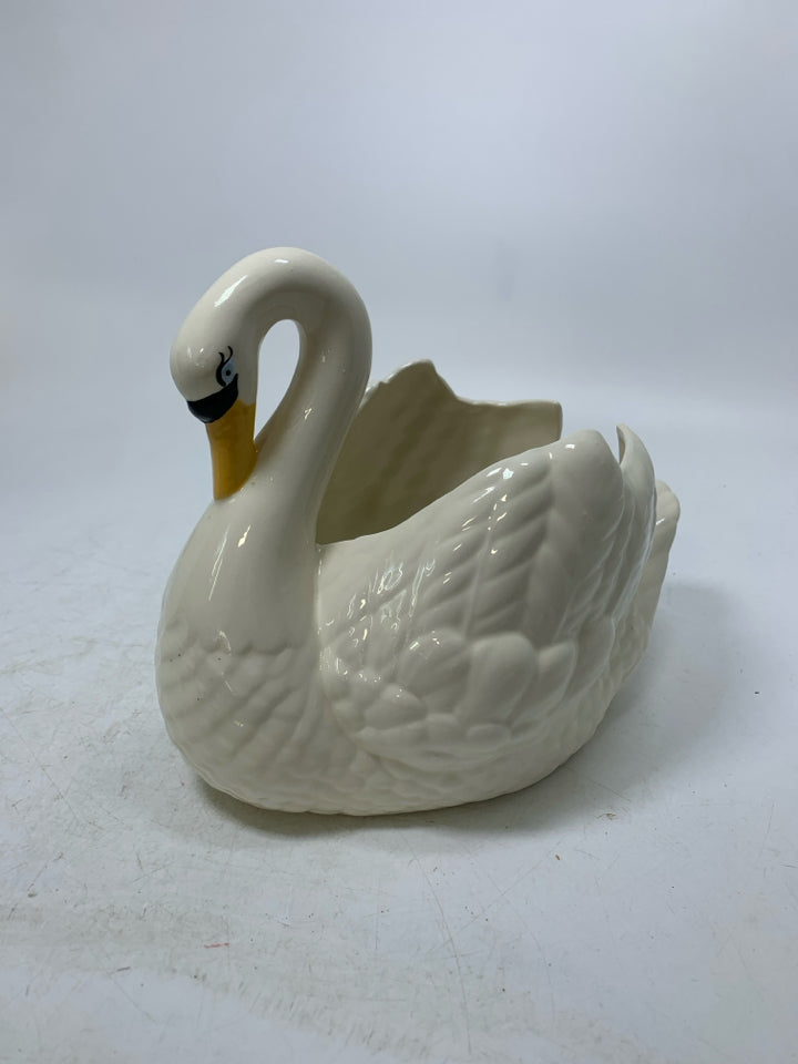 SWAN SHAPED PLANTER.