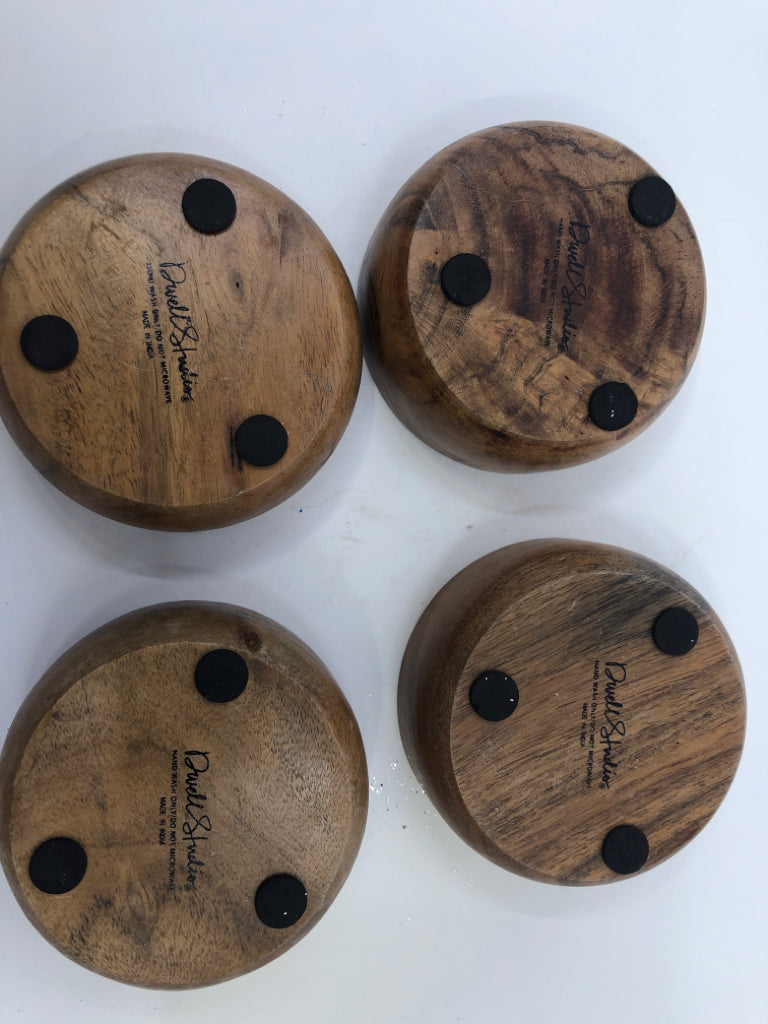 4 SMALL WOOD BOWLS.
