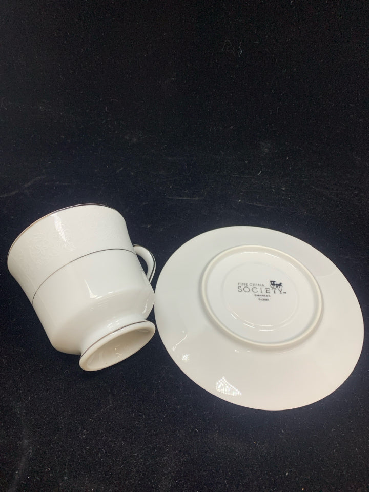 8PC LACE POINT TEACUP AND SAUCER SET.