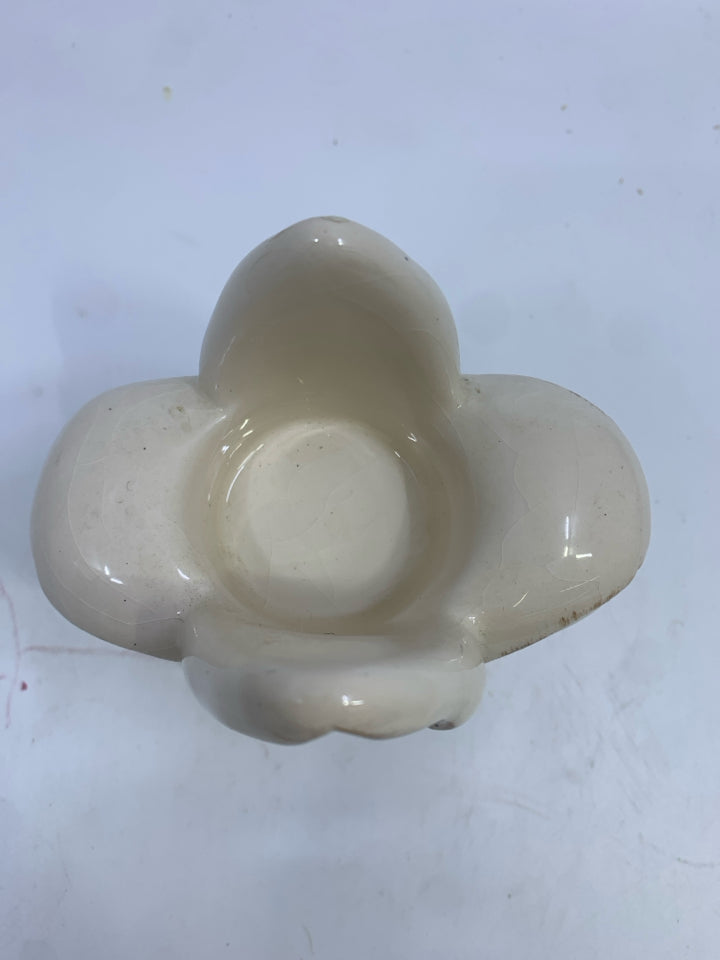 FLEUR-DE-LIS CERAMIC TEA-LIGHT HOLDER.