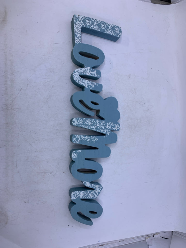 BLUE LOVE MORE WORDS SIGN.