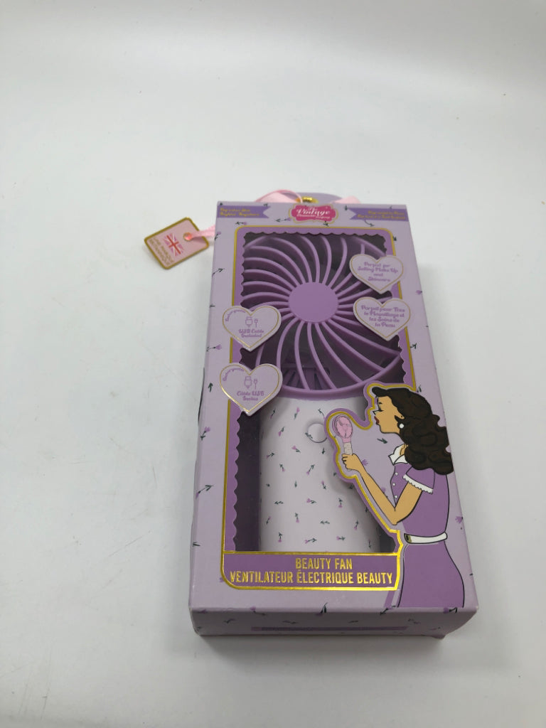 NIP PURPLE FLORAL BEAUTY FAN.