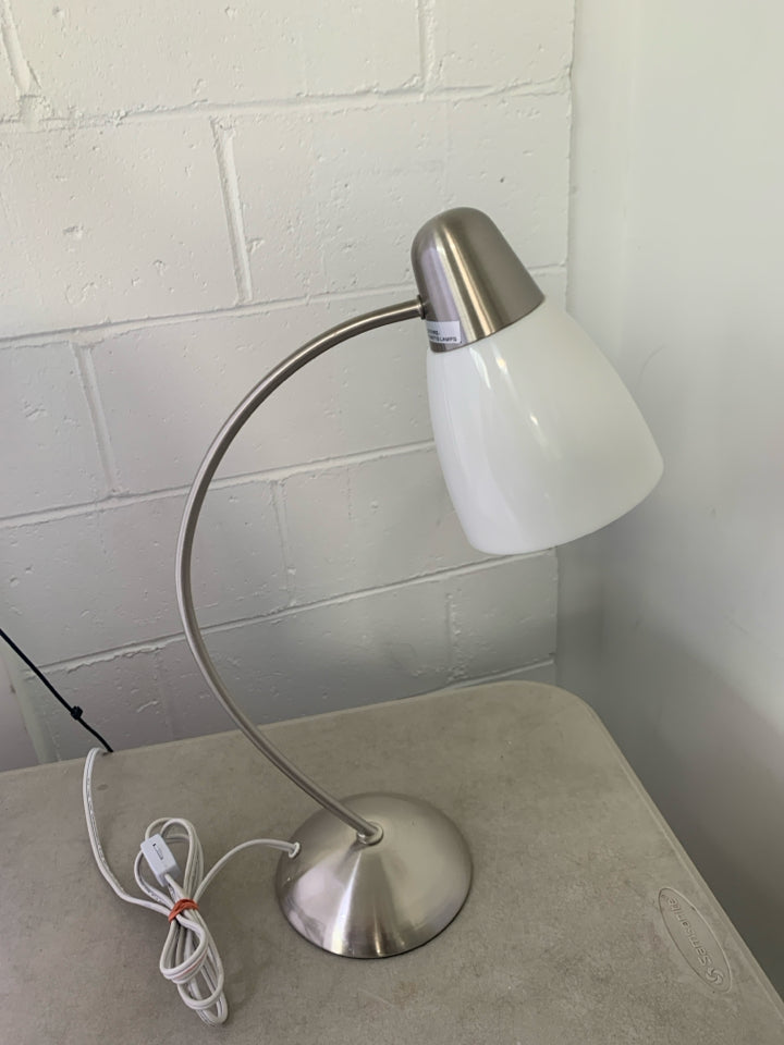 STAINLESS STEEL CURVED BASE LAMP W/ WHITE PLASTIC SHADE.