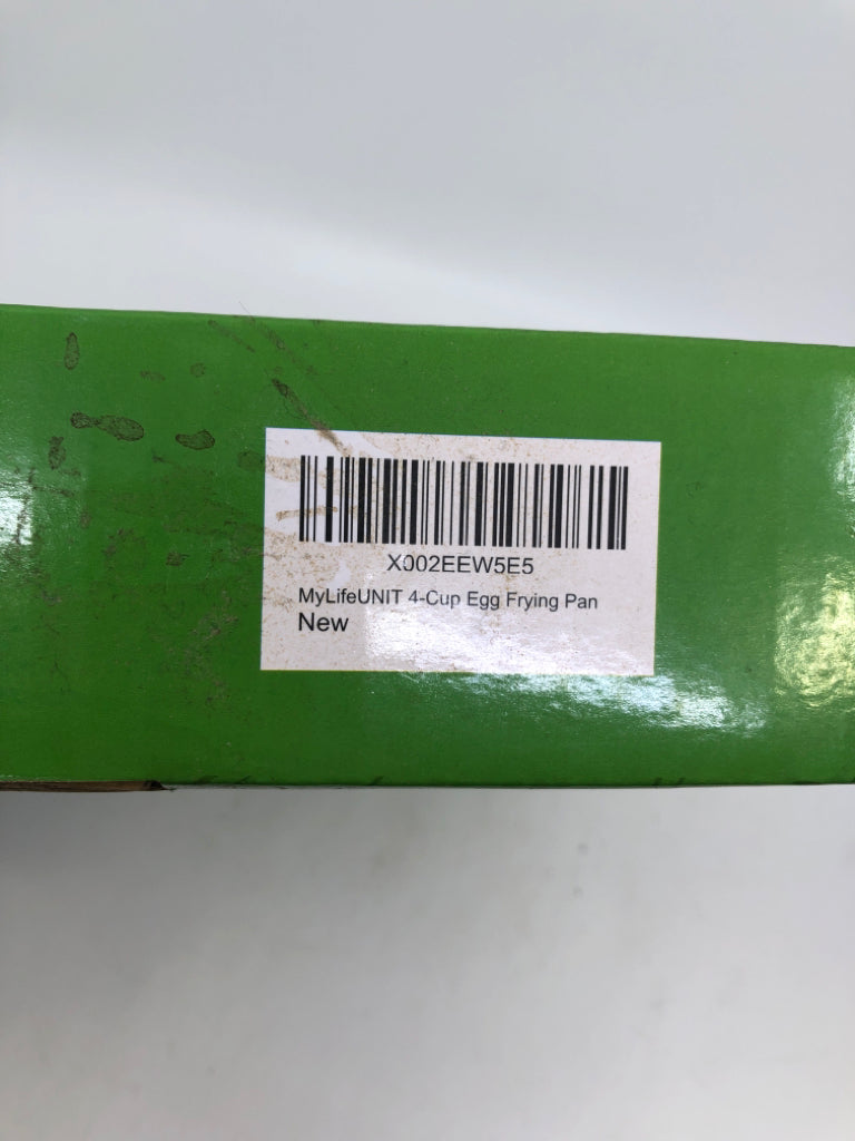 NIB 4-CUP EGG FRYING PAN.