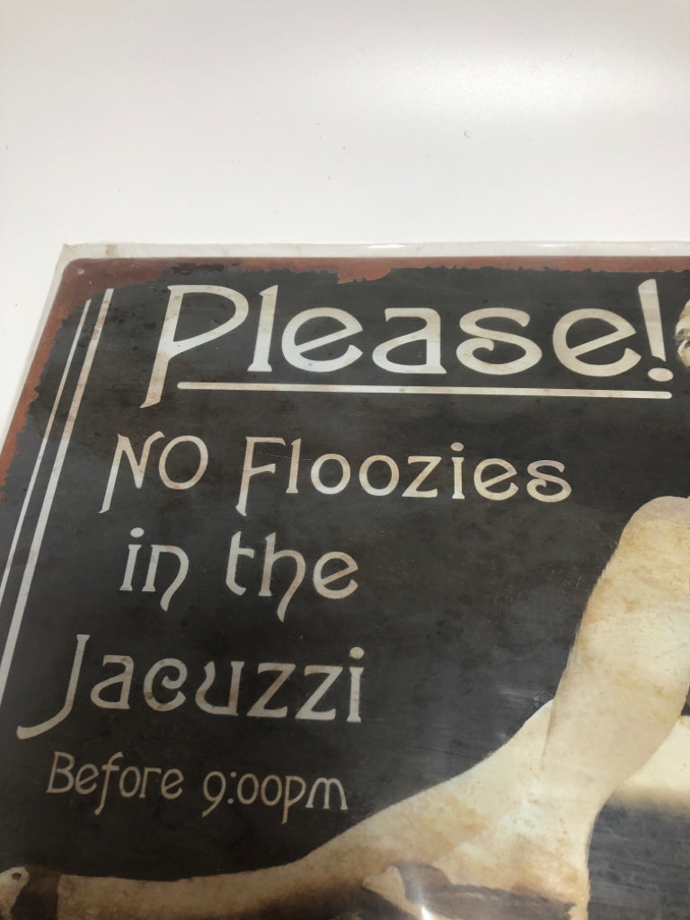 NIP NO FLOOZIES METAL SIGN.