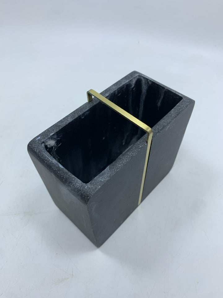 BLACK MARBLE TOOTHBRUSH HOLDER W/GOLD ACCENTS.