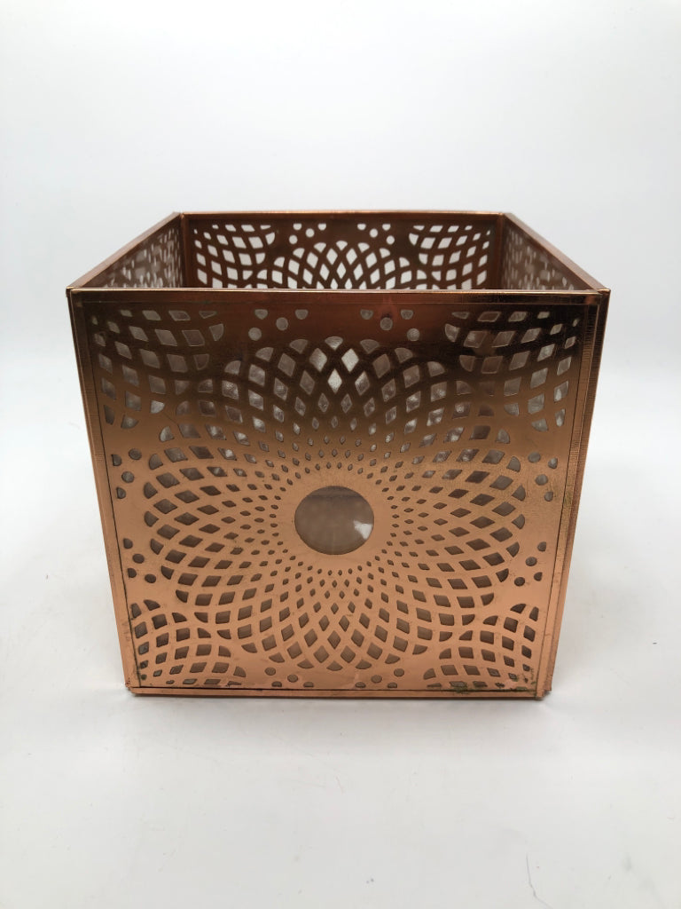 ROSE GOLD PIERCED CANDLE SLEEVE.