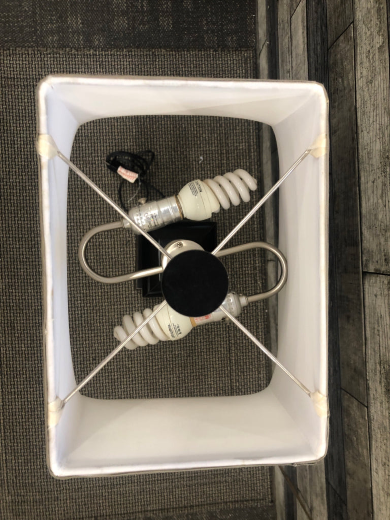 BLACK SQUARE BASE LAMP W TAN SQUARE SHADE.