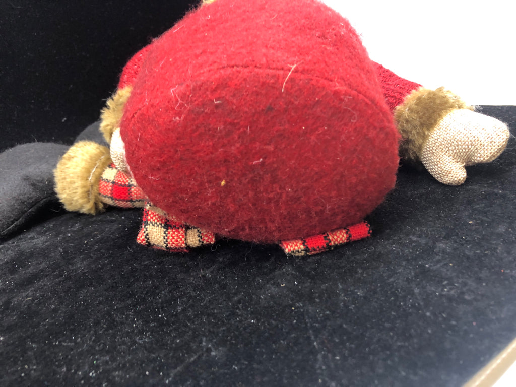 SHELF SITTING TEDDY IN RED COAT.
