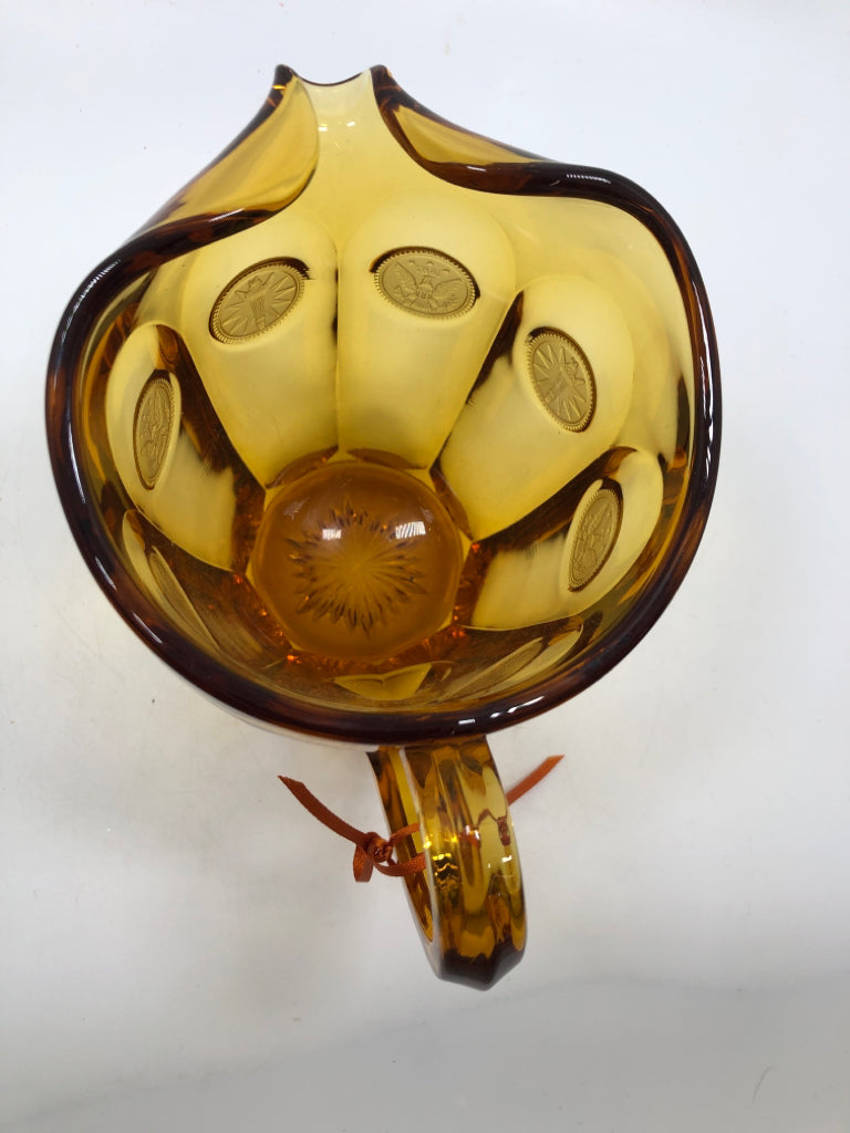 VTG AMBER GLASS PITCHER.