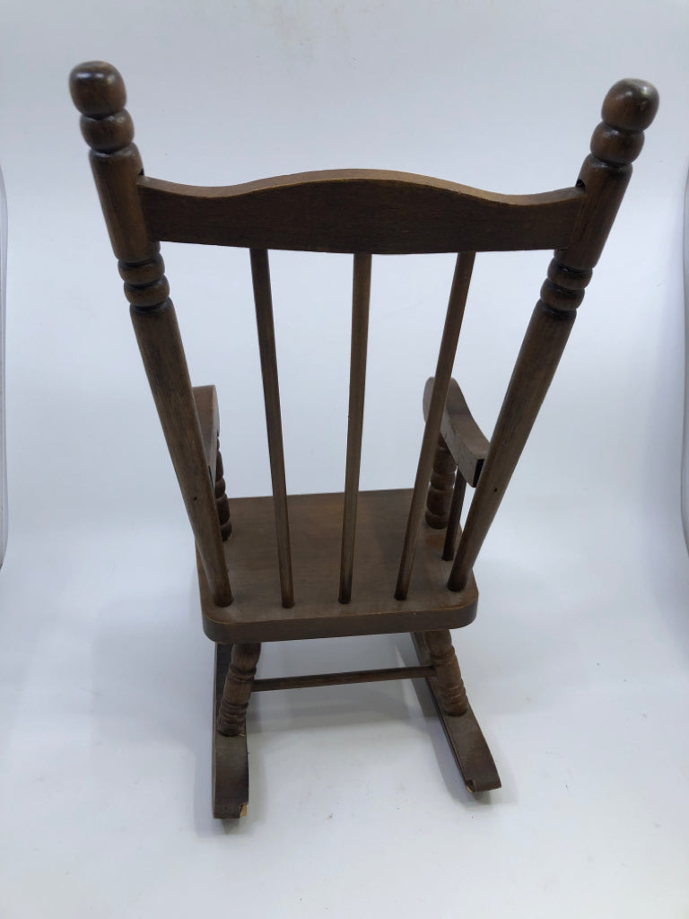 DOLL DARK WOOD ROCKING CHAIR.