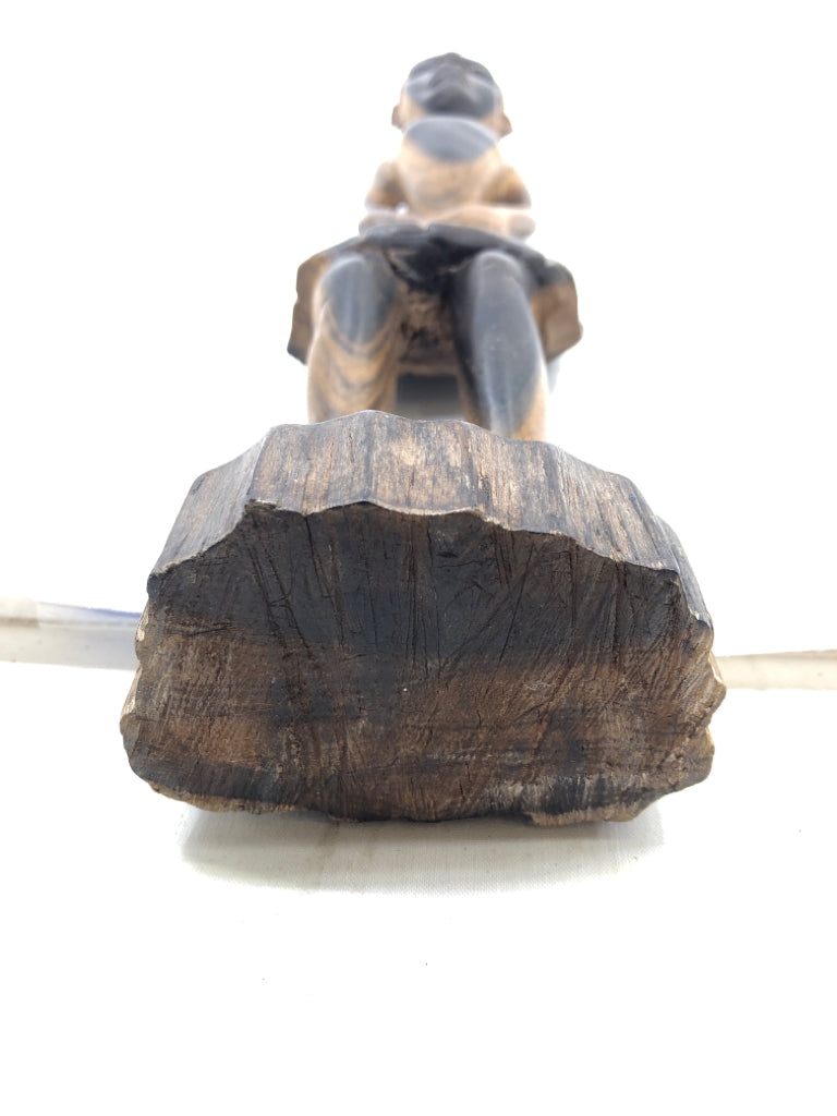 WOOD CARVED CHILD STANDING.