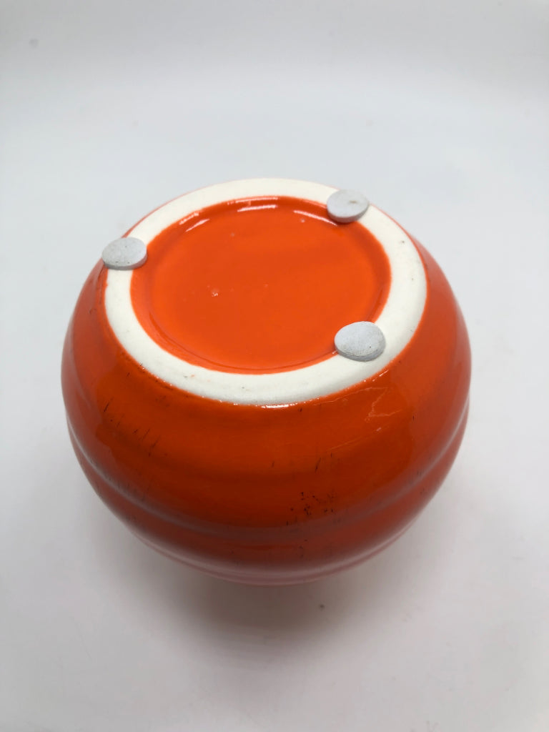 ORANGE CERAMIC RIBBED BUD VASE.
