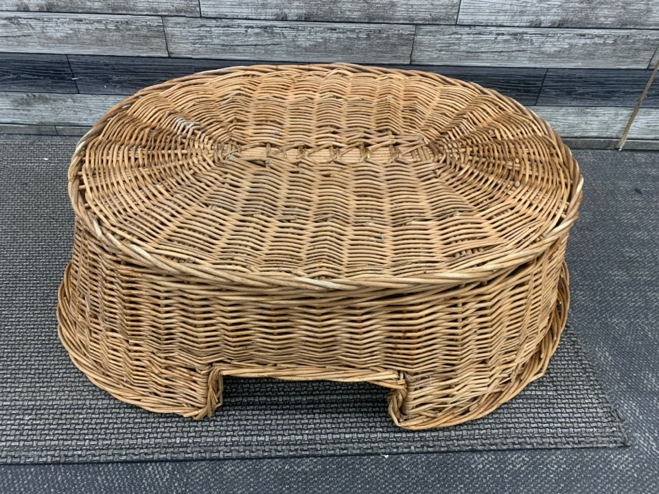 LARGE WICKER OVAL DOG BED.