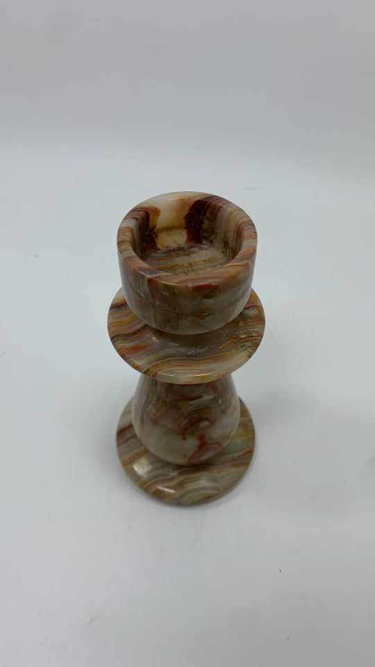 BROWN MARBLE CANDLESTICK HOLDER.