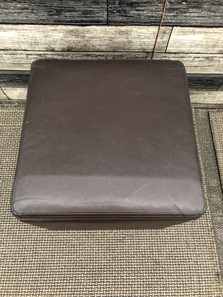 BROWN FAUX LEATHER STORAGE CUBE.