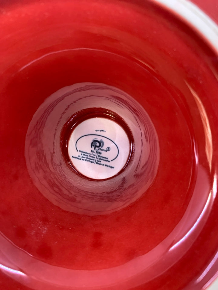 RED CERAMIC W/ WAVY EDGE.