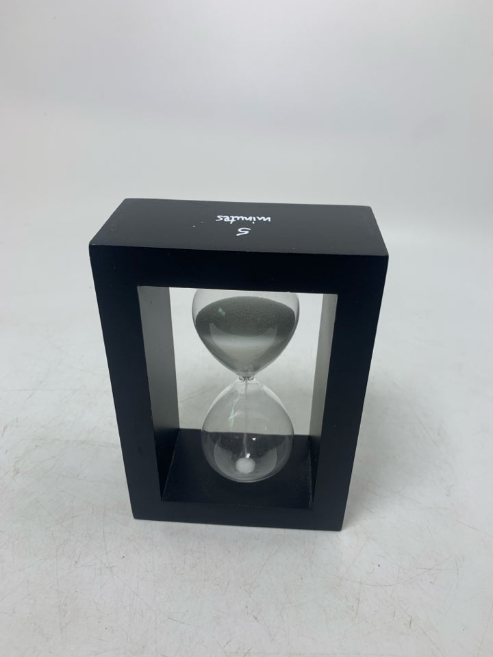 HOUR GLASS IN FRAME.
