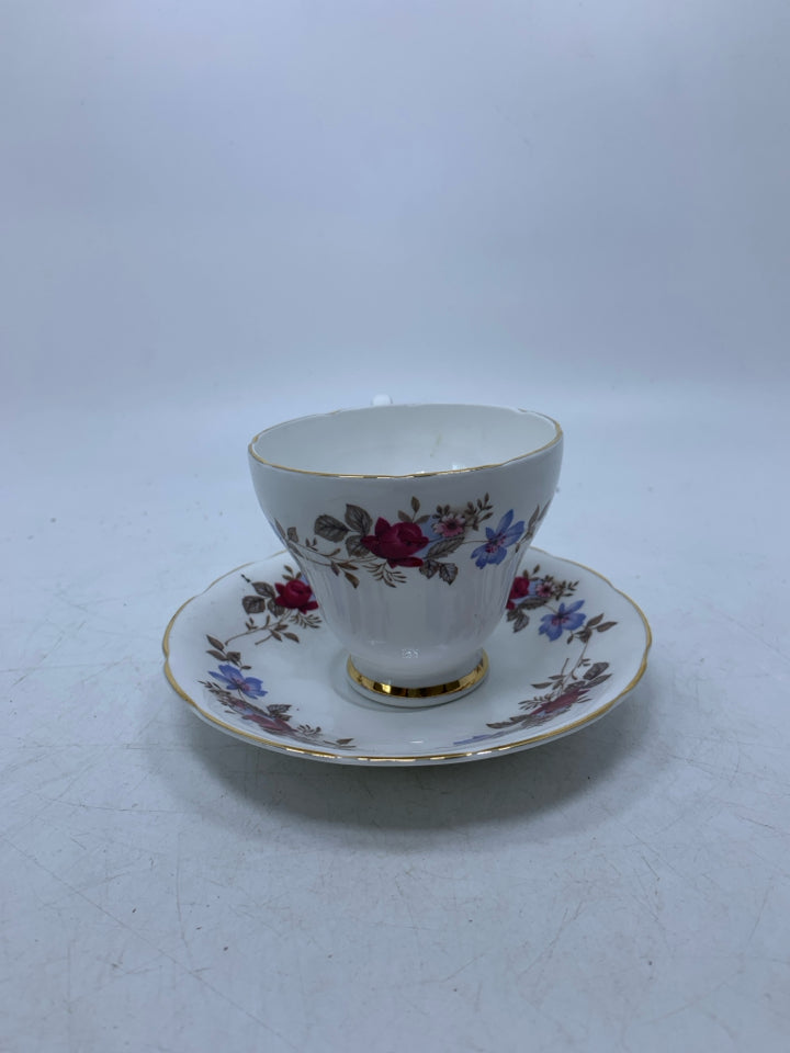MULTI- COLORED FLOWERS TEACUP/SAUCER.