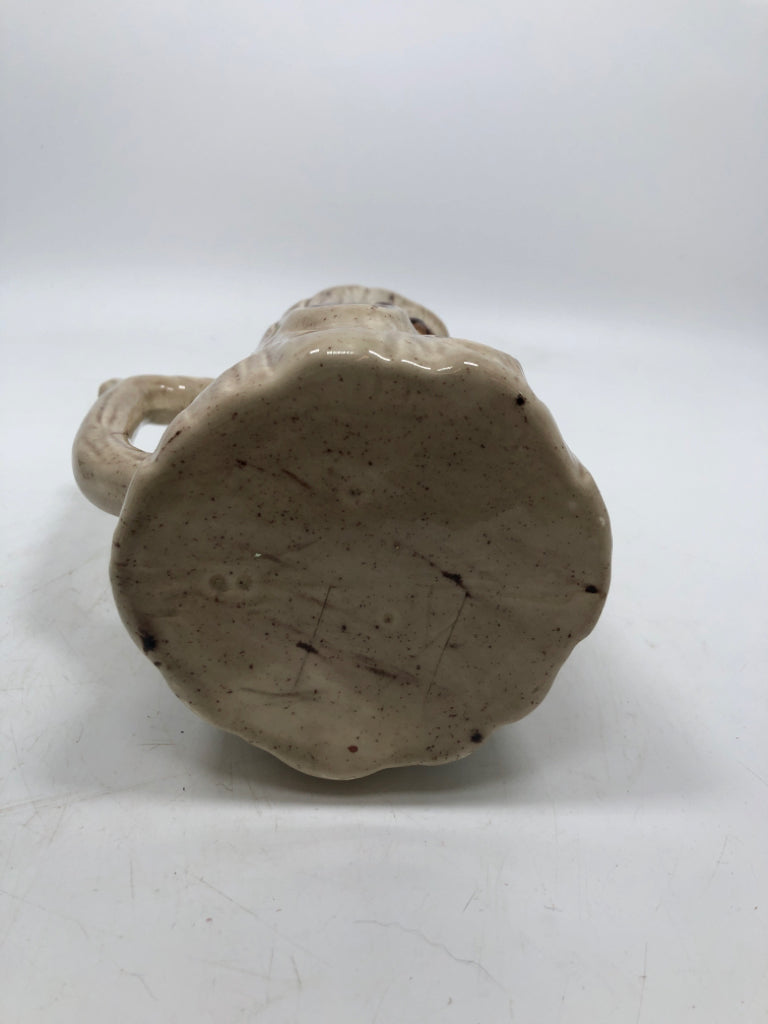 TREE TRUNK PITCHER W/ EMBOSSED MUSHROOMS.