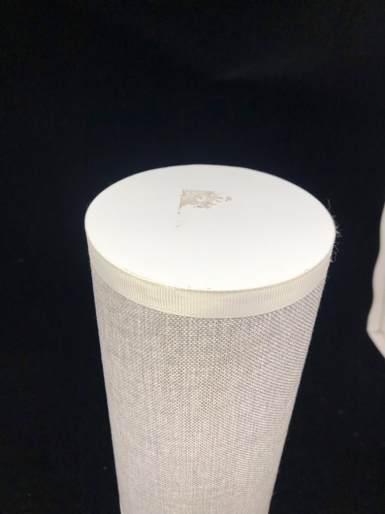 WHITE PILLAR HEADBAND STAND W/ GREY FABRIC.