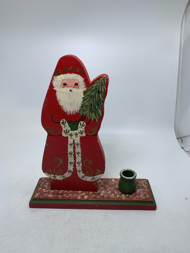 VTG PAINTED WOOD SANTA W/ A TAPERED CANDLE SLOT NEXT TO HIM.