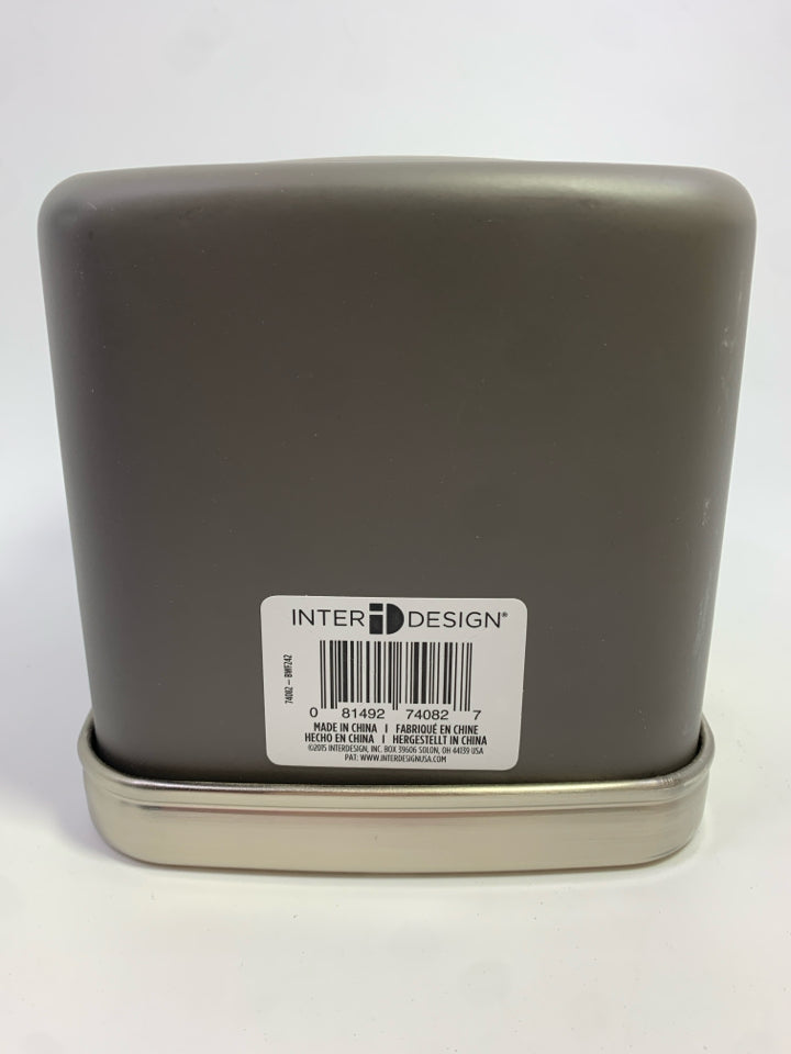 GREY TISSUE BOX COVER W/SILVER RIM ON BOTTOM.