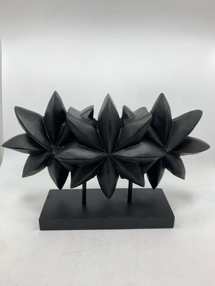 FLOWER SHAPED DECORATIVE SCULPTURE.