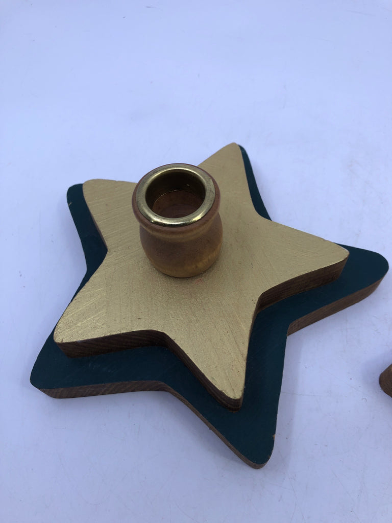 2 GOLD/GREEN STAR TAPER CANDLE HOLDERS.