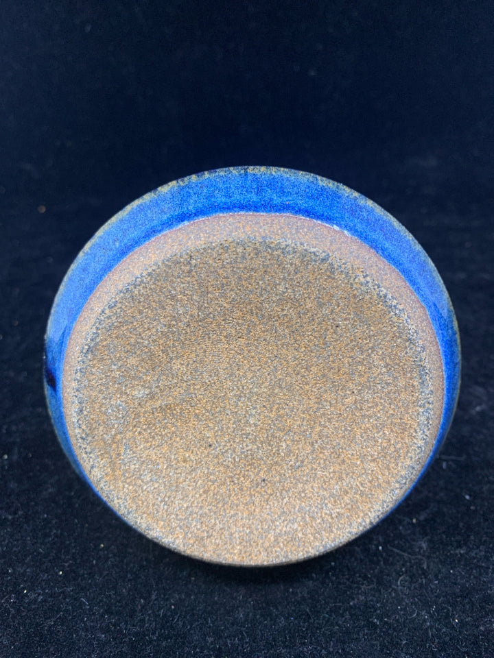 BLUE POTTERY TAPER CANDLE HOLDER.
