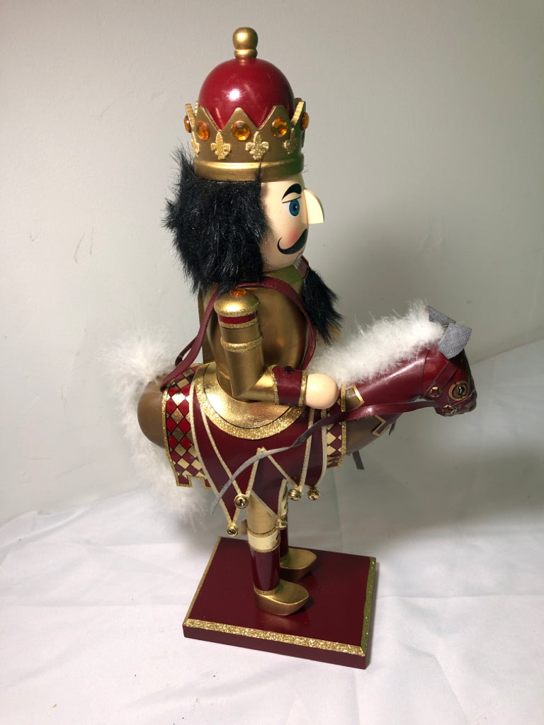 RED AND GOLD NUT CRACKER .