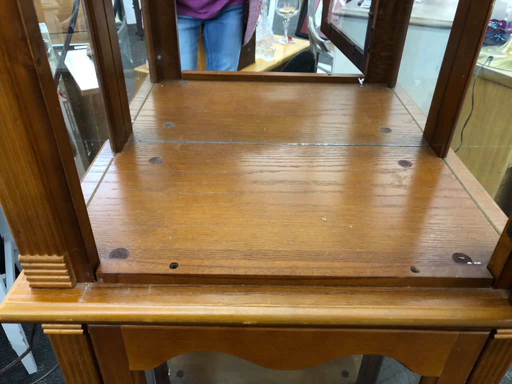 CURIO CABINET W/LIGHTS & GLASS SHELVES.