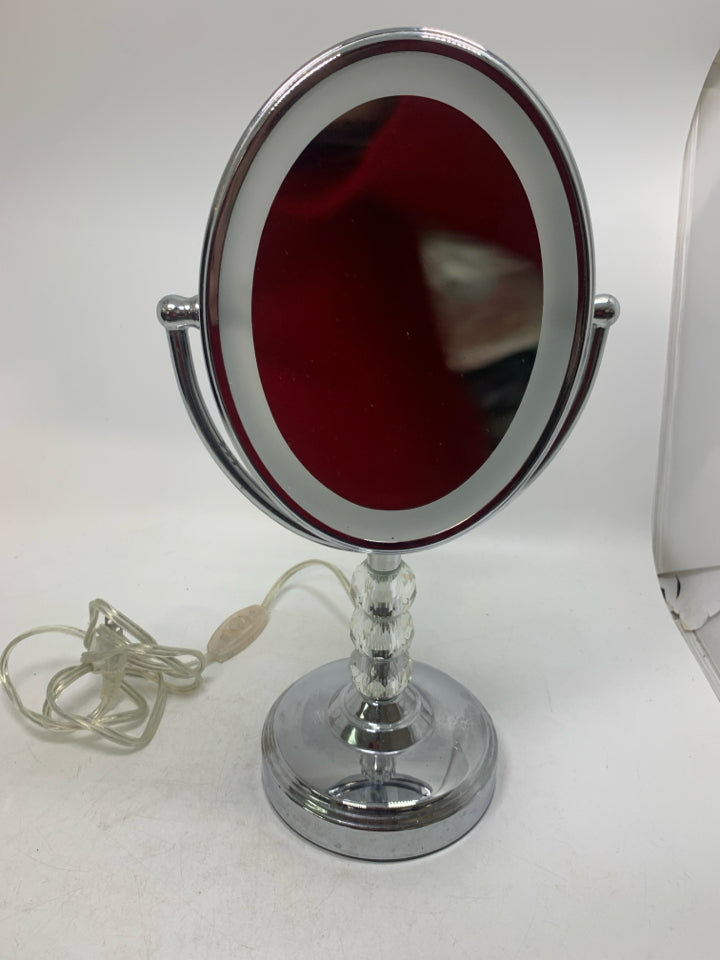 OVAL LIGHT UP VANITY MIRROR.