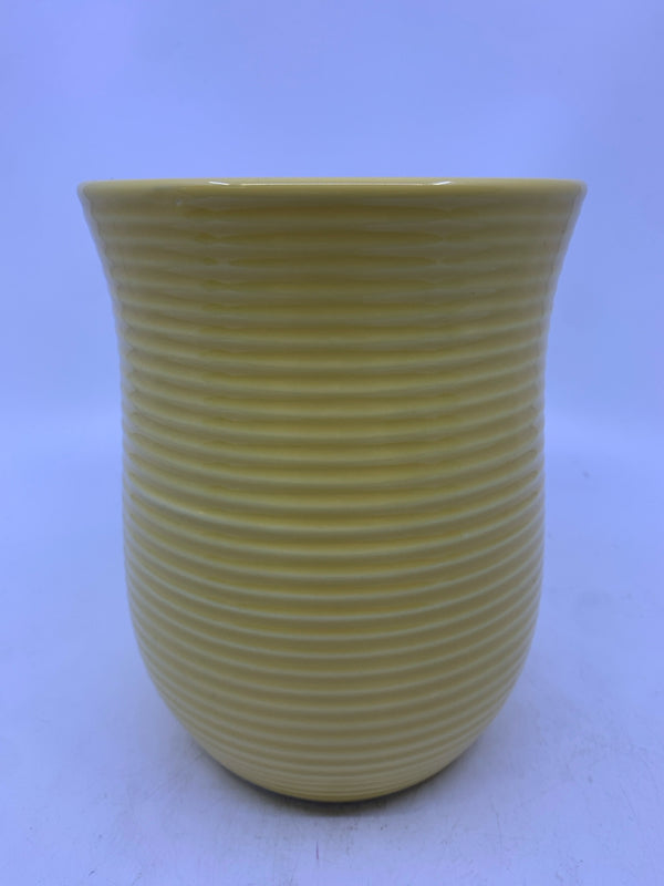 YELLOW RIBBED FLARED TOP VASE.