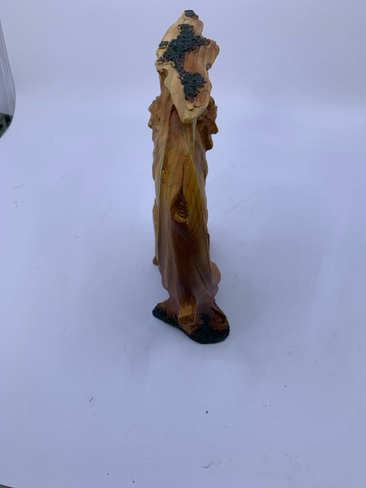 MALE LION ON ROCK COVERED BY TREE W/ LIONESS BELOW CARVED.