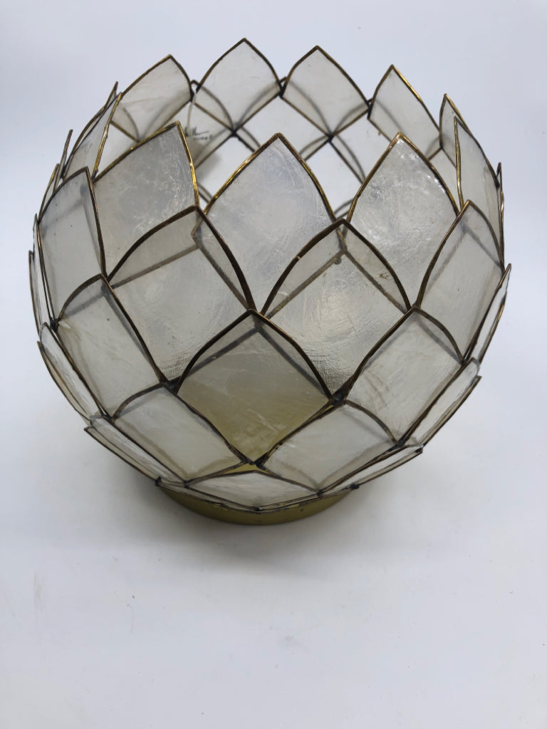 DELICATE FLORAL EGG SHAPED CANDLE HOLDER.