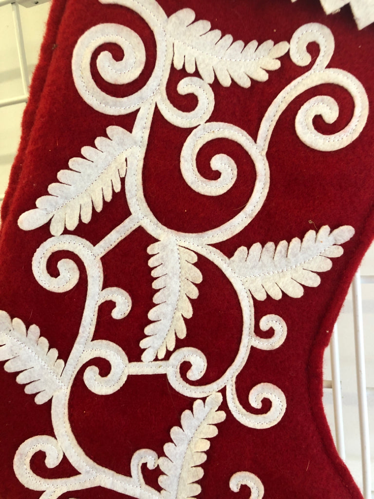 RED WHITE SWIRL STOCKING.