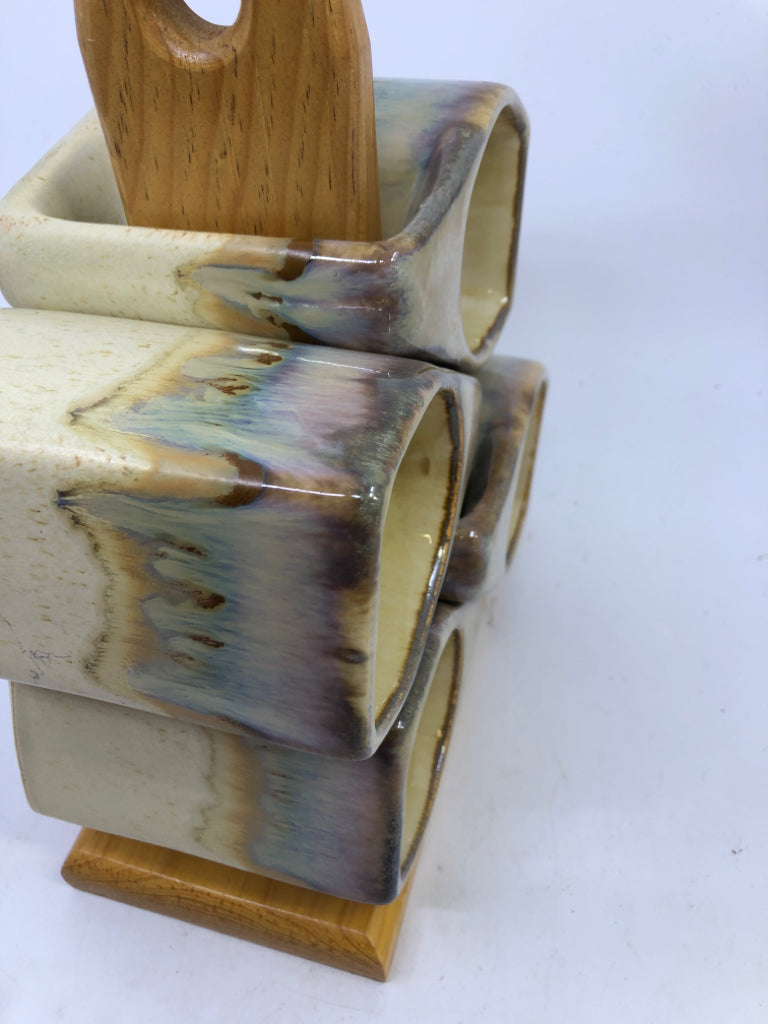 4 DRIP GLAZE POTTERY MUGS W WOODEN STAND.