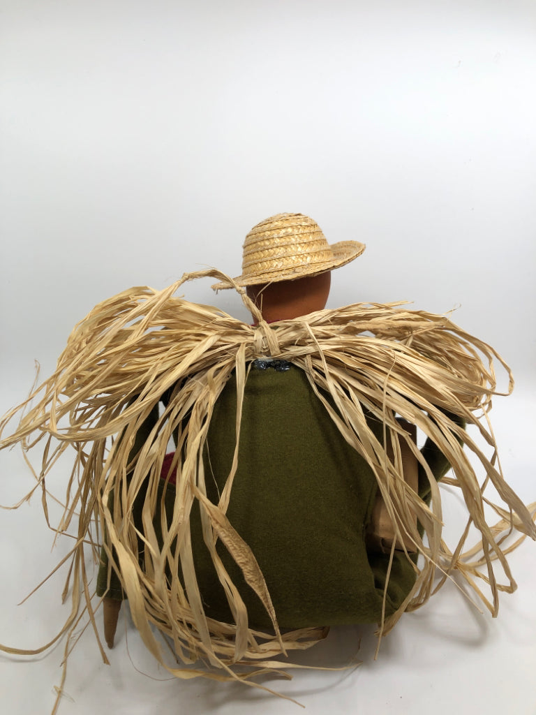SCARECROW WOMAN W/BAG OF CHESTNUTS.