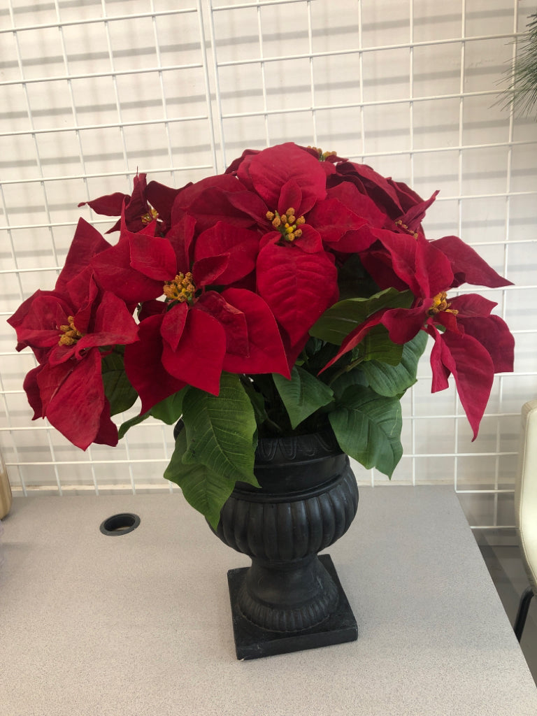 FAUX POINSETTIA IN HEAVY CERAMIC PLANTER.