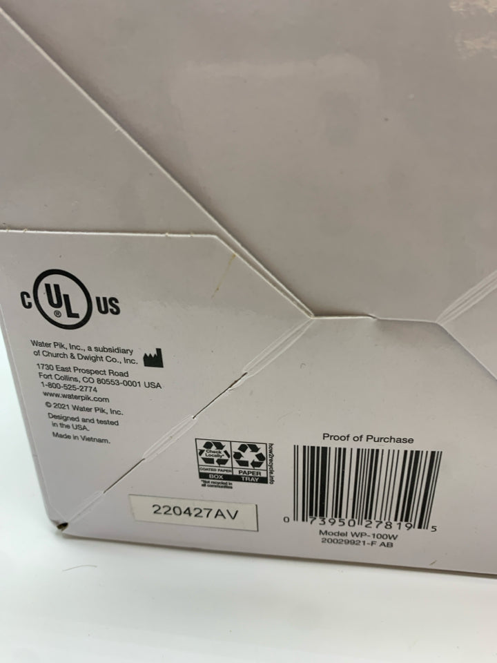 NIB WATERPIK WATER FLOSSER.
