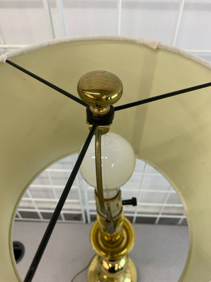 GOLD SKINNY LAMP W/WHITE SHADE.