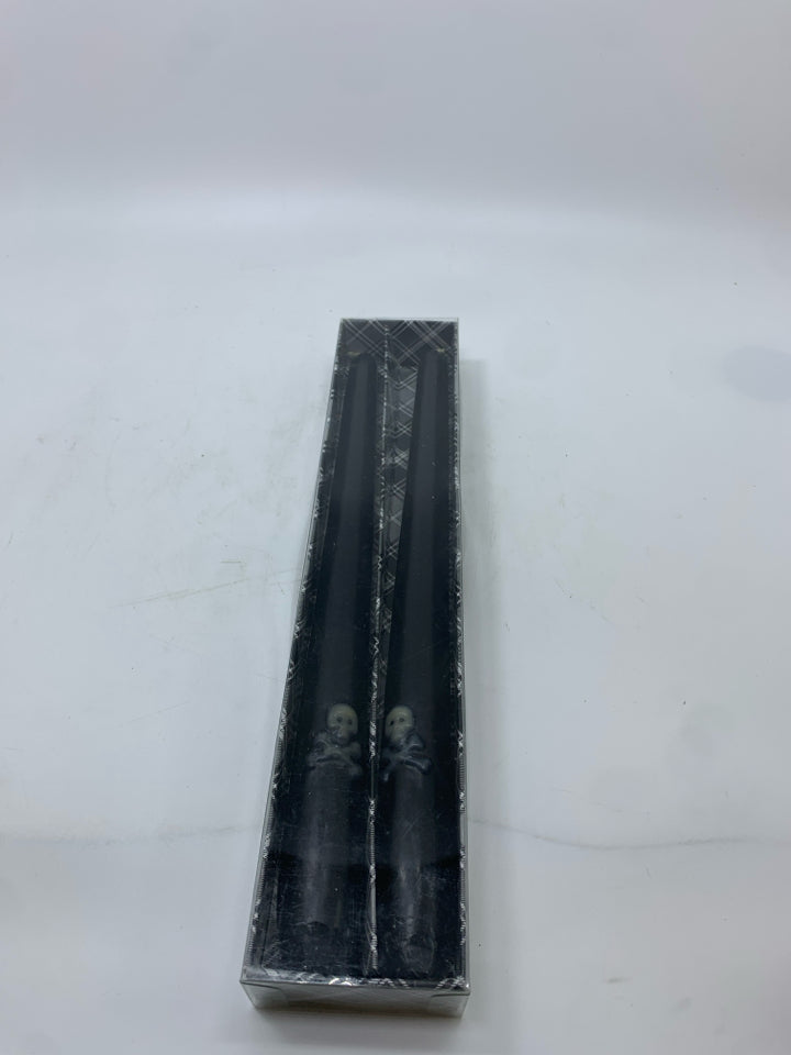 NIB 2PK BLACK TAPER CANDLE WHITE SKULL/CROSSBONES.