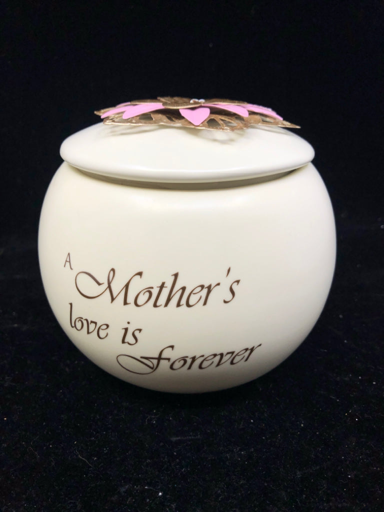 A MOTHERS LOVE- COVERED CANISTER.