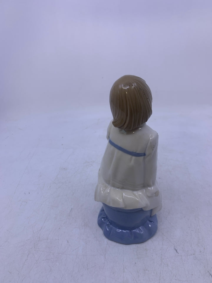 SITTING GIRL W/ ROSE IN HAND.