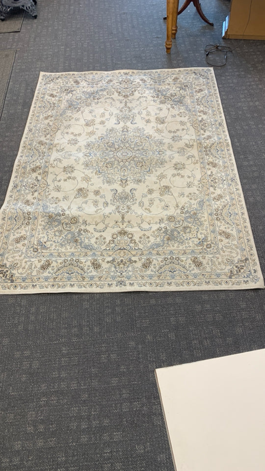 CREAM AREA RUG W/ BLUE,BROWN,GREY PAISLEY DESIGN EDEN.