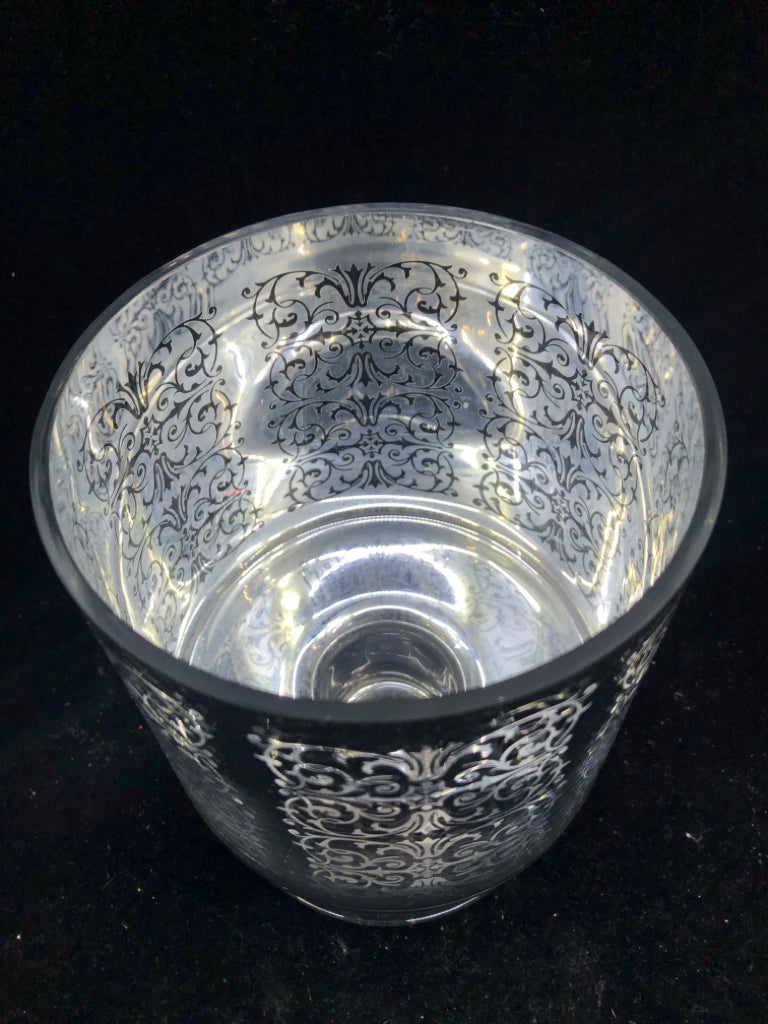 SILVER MERCURY GLASS FOOTED PILLAR CANDLE HOLDER.