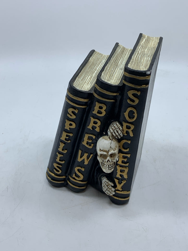 SKELETON BOOK STACK.