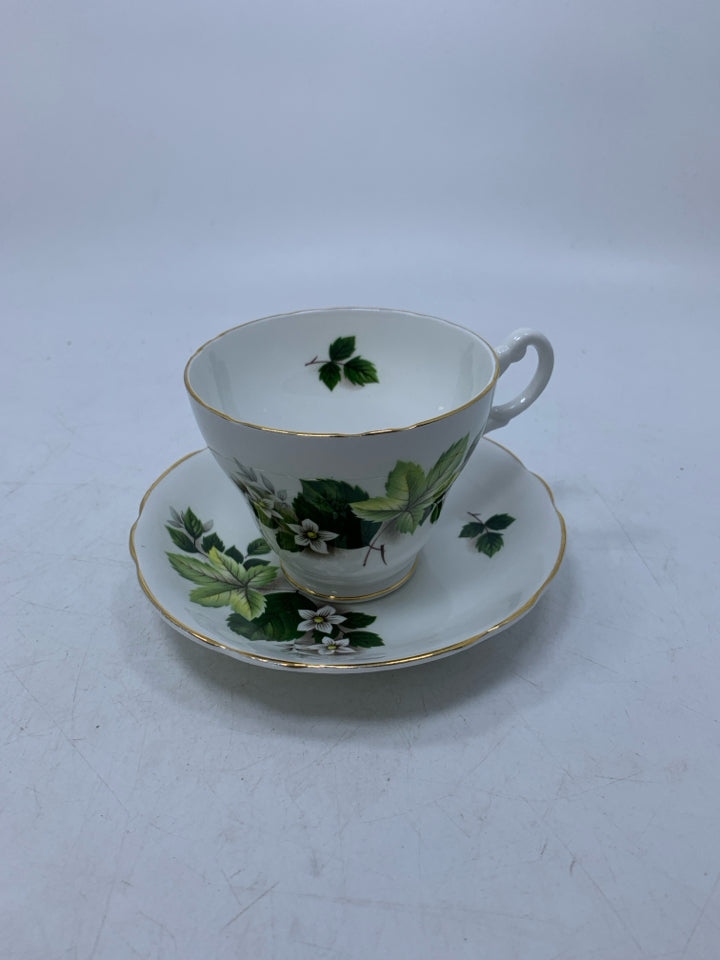 SMALL WHITE FLOWERS TEACUP SAUCER.