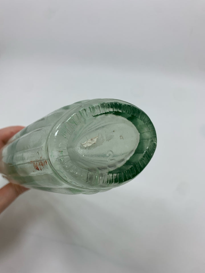 CLEAR GLASS RIBBED BOTTLE.